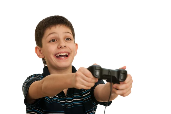 Glühender Junge in Schwarz spielt Computerspiel mit Steuerknüppel — Stockfoto