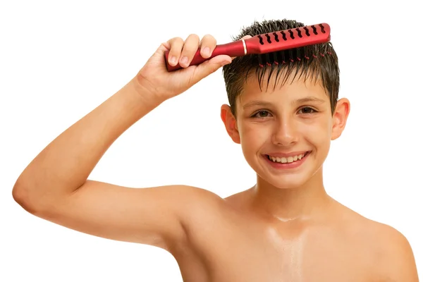 stock image Smiling boy is making his haircut fine