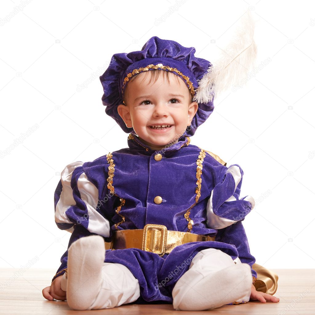 Cheerful toddler in a carnival suit