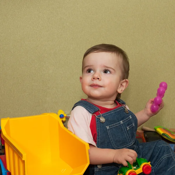 Toddler with toys — Stock Photo, Image