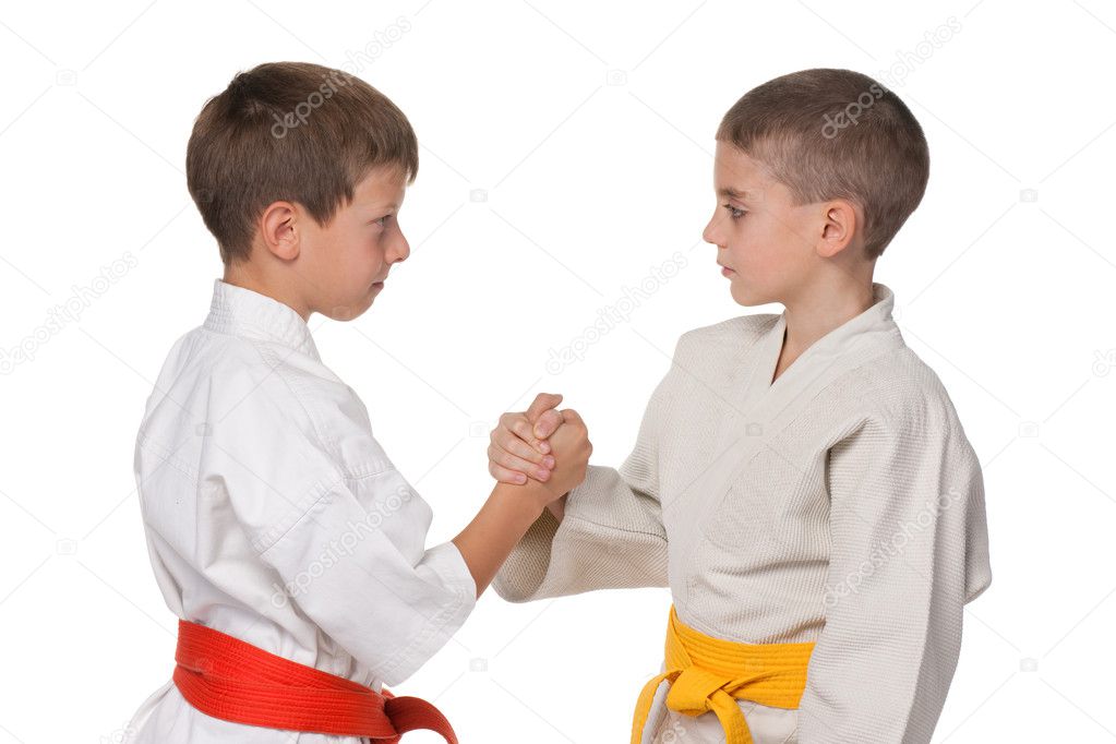 Handshaking boys in kimono