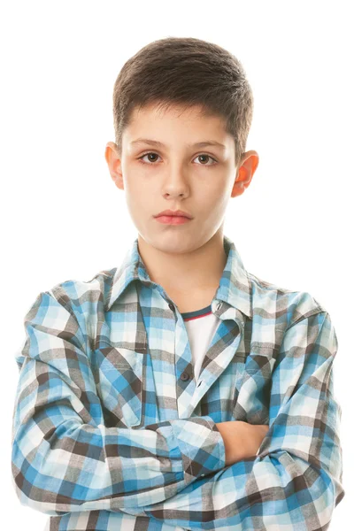 Ernstige jongen in ingecheckte shirt — Stockfoto