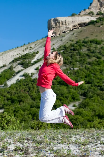 stock image Happy woman at the mountains