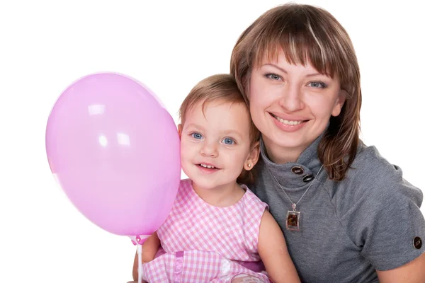 Smiling girl in pink and her mom — Stock Photo, Image