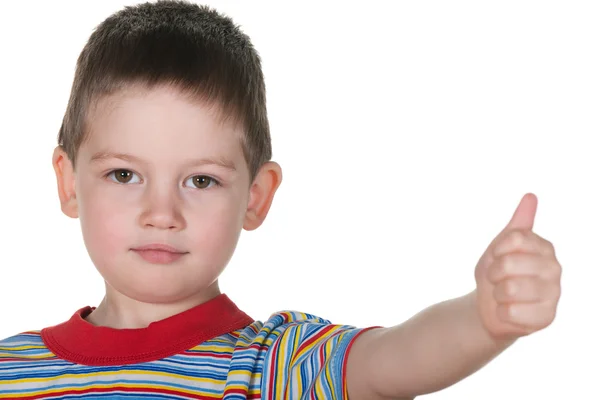 Klein jongetje houdt zijn duim omhoog — Stockfoto