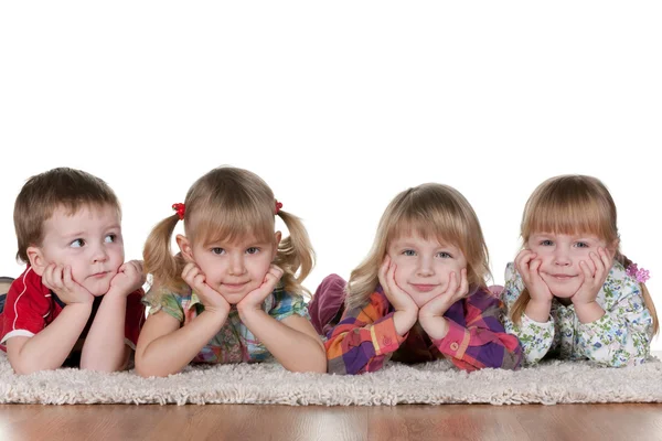 Lonely little boy at three beautiful girls — Stock Photo, Image