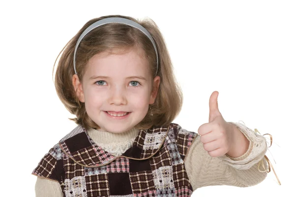 Sorrindo menina loira segurando seu polegar para cima — Fotografia de Stock