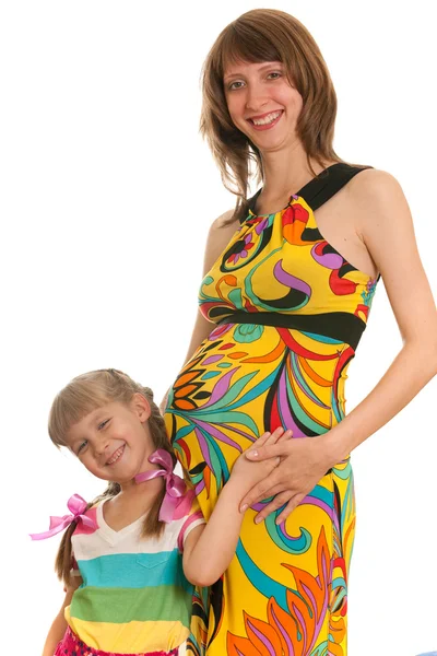 Rindo senhora grávida e sua filha mais velha — Fotografia de Stock