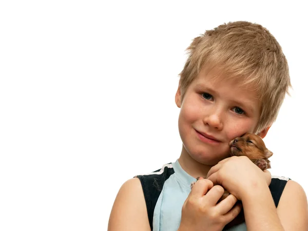 Portret chłopca z pewien szczeniak — Zdjęcie stockowe