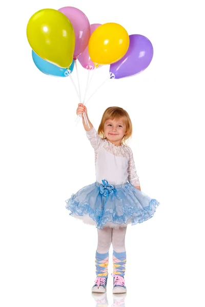 Glad liten flicka med ballonger — Stockfoto