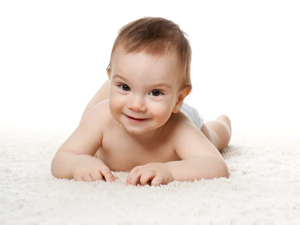 Niño en la alfombra — Foto de Stock