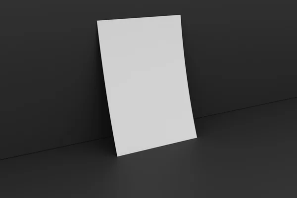Blanko-Papier gegen dunkle Wand — Stockfoto