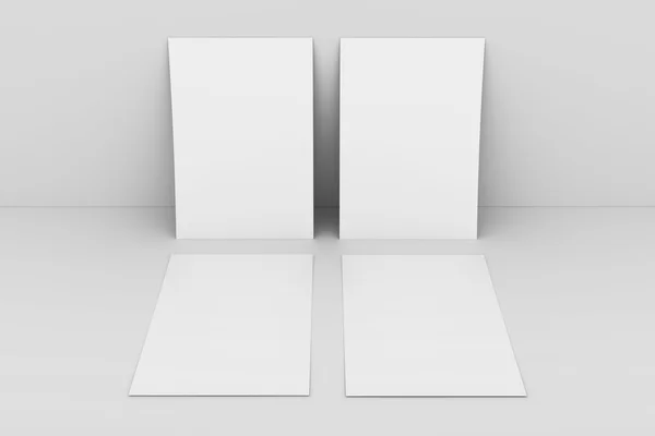 Papel en blanco contra pared blanca —  Fotos de Stock