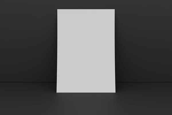 Blanko-Papier gegen dunkle Wand — Stockfoto