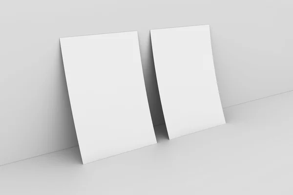 Tomt papper againstwhite vägg — Stockfoto