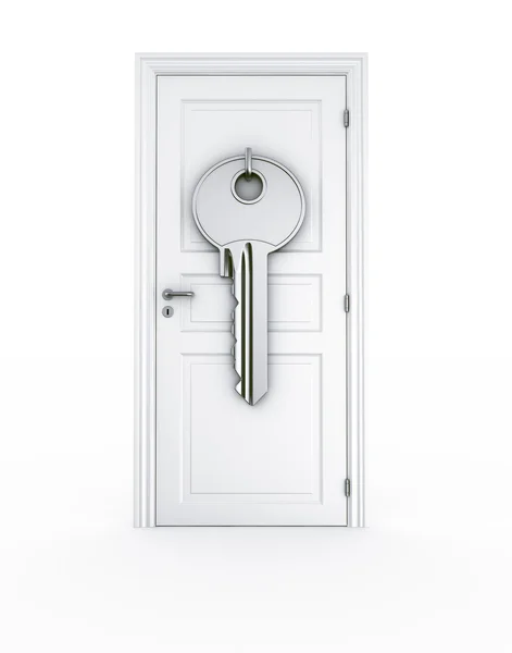 Дверь с огромным ключом — стоковое фото