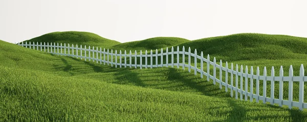 Cerca de piquete branco na grama — Fotografia de Stock