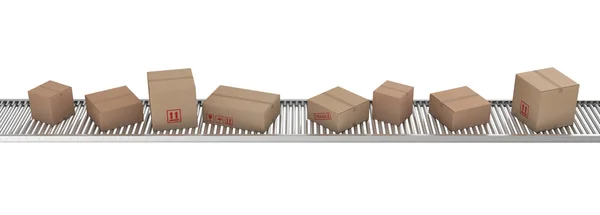 Cardboard boxes on conveyor belt — Stock Photo, Image