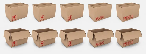 Картонные коробки с предупреждающими этикетками — стоковое фото