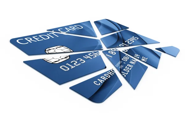Кредитная карта разрезана на куски — стоковое фото