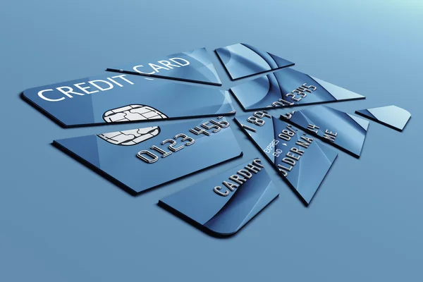 Cartão de crédito cortado em pedaços — Fotografia de Stock