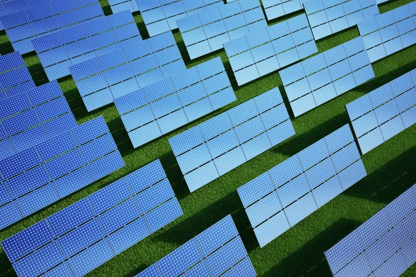 芝生のフィールド上の太陽電池パネル — ストック写真