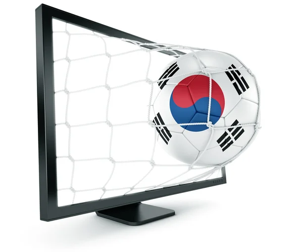 Pelota de fútbol saliendo del monitor — Foto de Stock