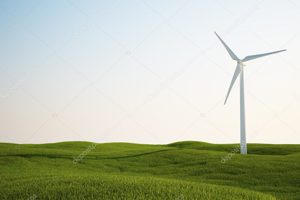 Wind turbine on green grass field