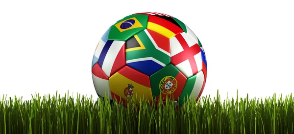 Soccerball s vlajkami v trávě — Stock fotografie