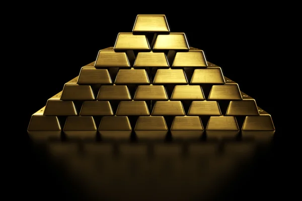 Goldbarren in einer Pyramide gestapelt — Stockfoto