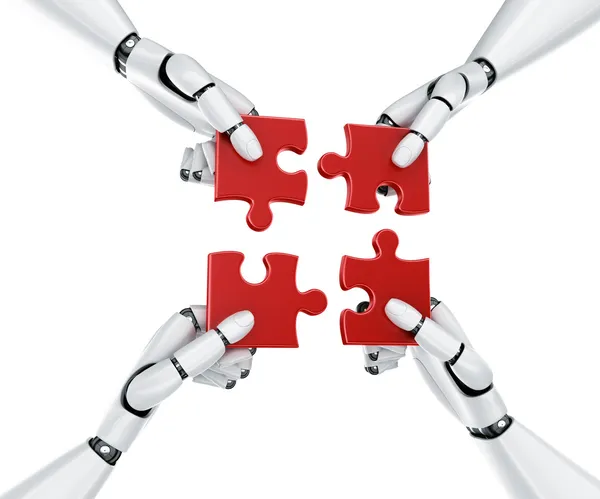 stock image Robot hands with puzzle pieces