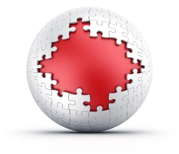 Puzzel bol met rood een rode kern — Stockfoto
