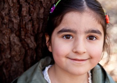 Close Up Portrait of a Smiling Happy Little Girl clipart