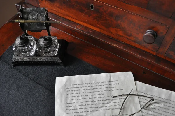 Stock image Antique writing desk with crystal inkwell