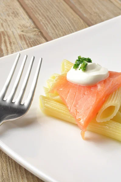 Pasta with smoked salmon — Stock Photo, Image
