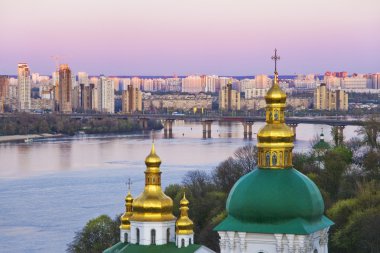 Lavra and Kiev in the evening. clipart