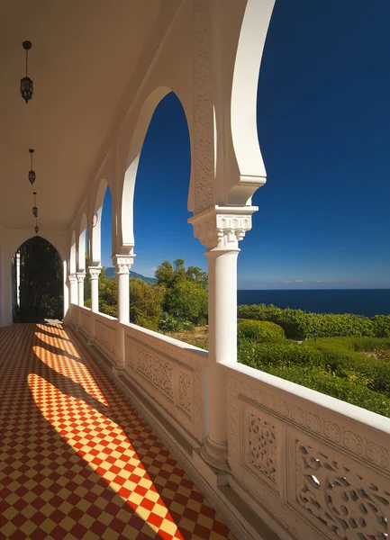 stock image Traditional oriental terrace with a view of the sea.