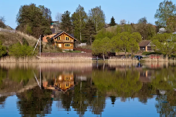 Stock image Country house near lake, Belarus