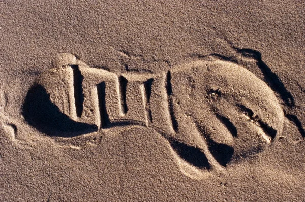 Stock image Footprint on sand