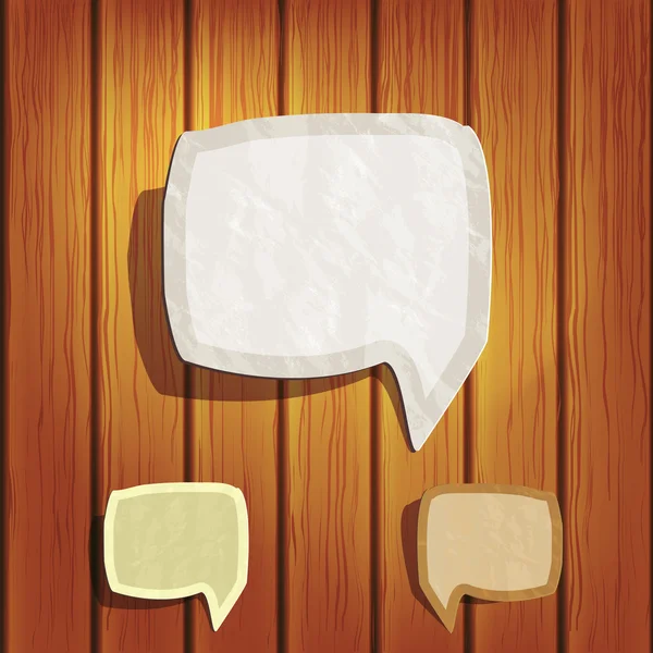 Bulles de discours papier sur fond en bois — Image vectorielle