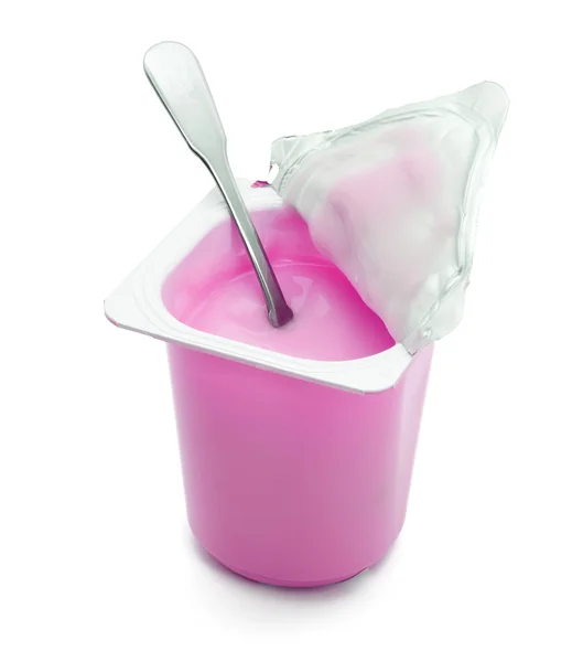 Детский йогурт с ложкой — стоковое фото