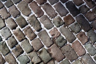 Cobble stone in the winter city clipart