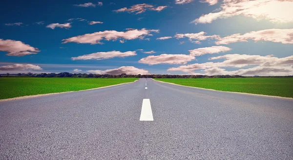 Cloudy road — Stock Photo, Image