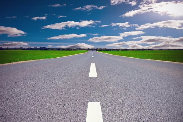 Cloudy road — Stock Photo, Image