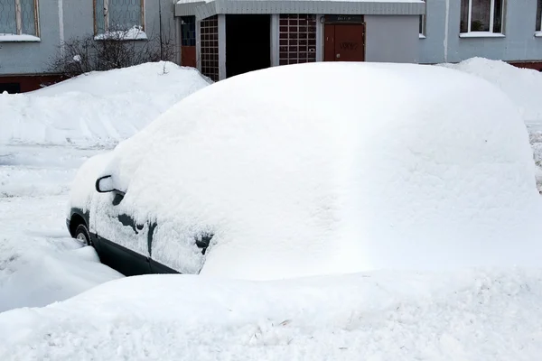 stock image Car covered by big amount of snow