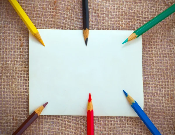 Carta bianca con matite — Foto Stock