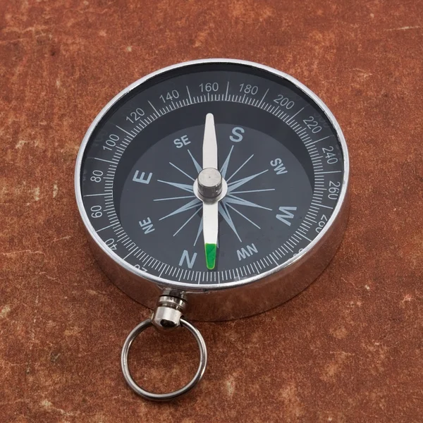 Compass on old surface — Stock Photo, Image