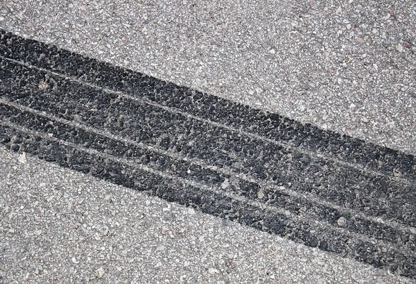 stock image Tire track on asphalt