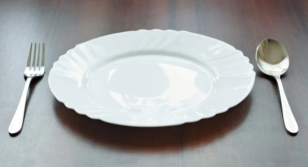 Plate on table — Stock Photo, Image