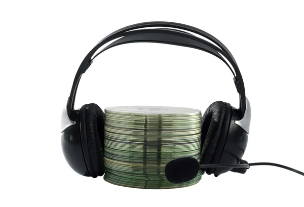 Colección de auriculares y cd aislada sobre fondo blanco — Foto de Stock